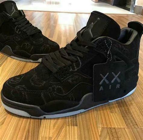 fake nike air jordans retro 4 kaws black|kaws x air jordan 4s real.